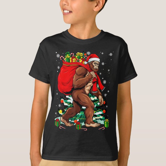 Bigfoot Santa Carrying Christmas Bag Xmas Hat Sasq T-Shirt (Front)