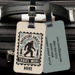 BigFoot Sasquatch Funny squatchy Forest Vintage Luggage Tag<br><div class="desc">Capture the spirit of timeless exploration with this vintage style luggage tag, featuring a silhouette of Bigfoot striding across a tranquil, snowy landscape. The headline "Adventure Awaits" is in a distressed font, while "Travel More" is below for a retro touch. Framed by two stylized pine trees and a classic scalloped...</div>