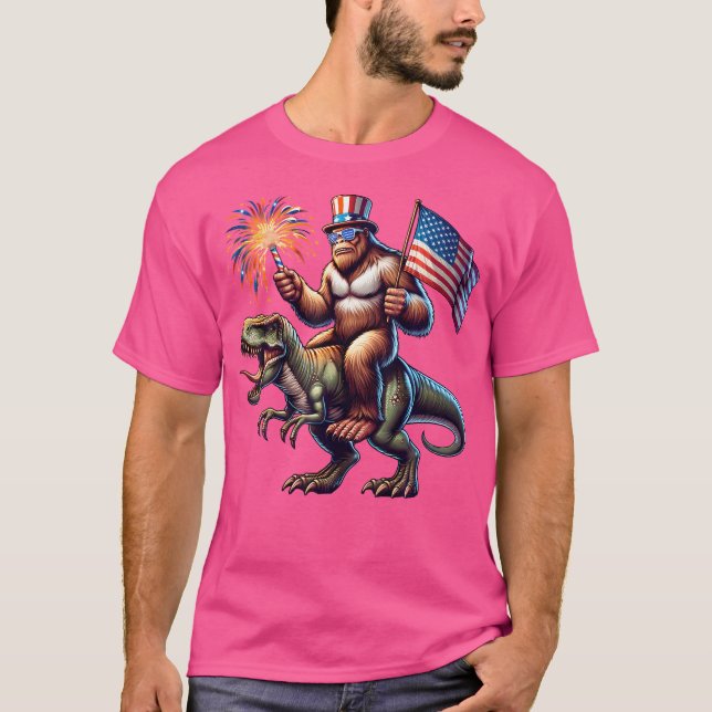 Bigfoot Sasquatch Riding Dinosaur T Rex. Funny 4Th T-Shirt (Front)
