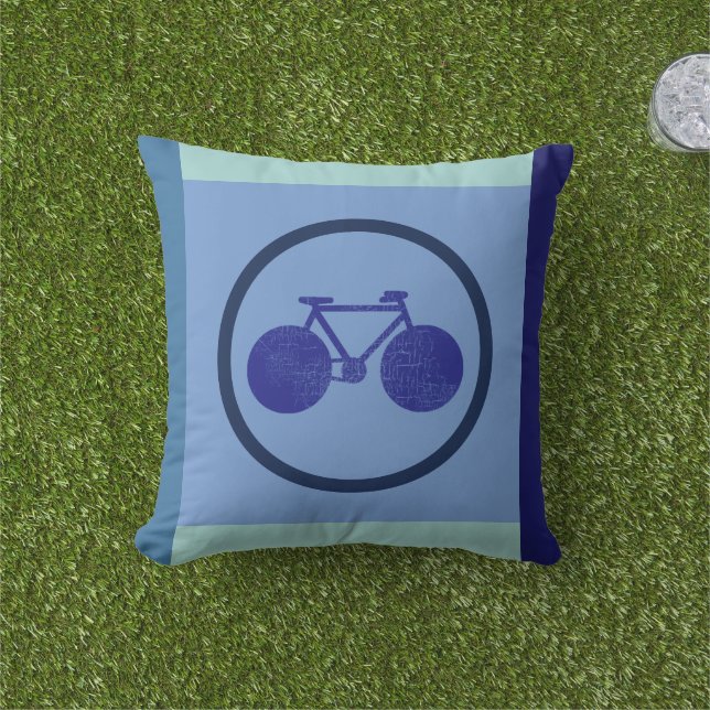 Bike-inspired design of bicycle on geometric blue outdoor pillow (Grass)