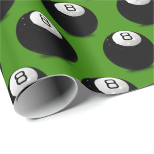 billiard eight ball on green wrapping paper