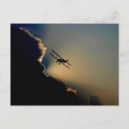 Biplane and sunset postcard