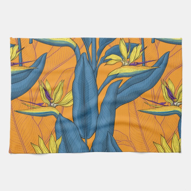 Bird of paradise flowers on orange kitchen towel (Horizontal)