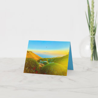 Bird over blue sea card