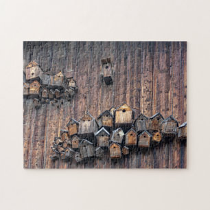 Birdhouses on a wooden wall, fun and tricky jigsaw puzzle