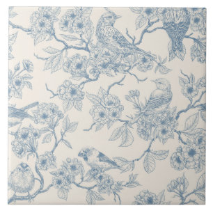 Birds and cherry blossom in blue and off white ceramic tile