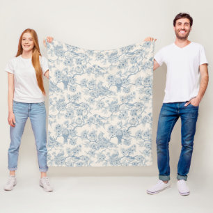 Birds and cherry blossom in blue and off white fleece blanket
