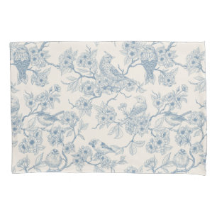 Birds and cherry blossom in blue and off white pillow case