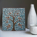 Birds and Tree of Life Muted Blue Art Nouveau Ceramic Tile<br><div class="desc">Welcome to CreaTile! Here you will find handmade tile designs that I have personally crafted and vintage ceramic and porcelain clay tiles, whether stained or natural. I love to design tile and ceramic products, hoping to give you a way to transform your home into something you enjoy visiting again and...</div>