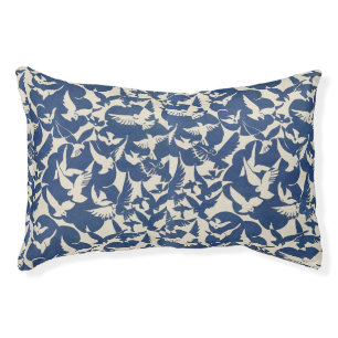 Birds in blue and white pet bed