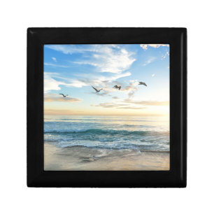 Birds in flight over the ocean gift box