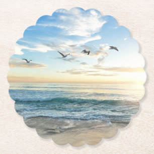Birds in flight over the ocean paper coaster