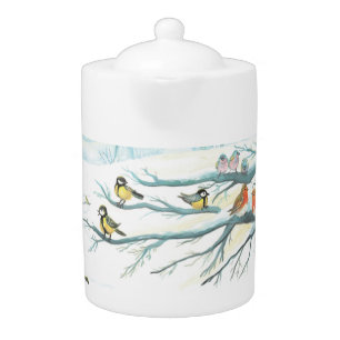 Birds in the white snow winter teapot