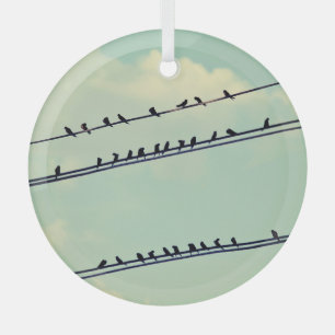 Birds on wires, vintage blue sky. glass ornament