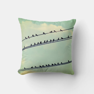 Birds on wires, vintage blue sky. throw pillow