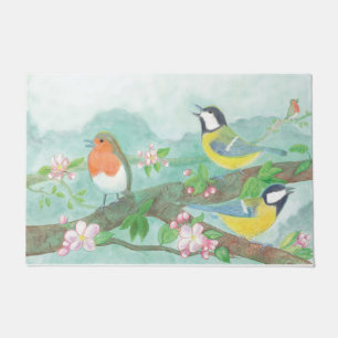 Birds singing on a blossoming tree branch doormat