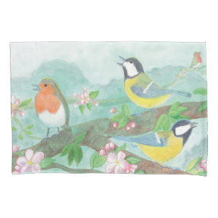 Birds singing on a blossoming tree branch pillow case