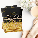 Birthday black gold glitter sparkle monogram name wrapping paper sheets<br><div class="desc">Elegant,  classic,  glamorous and feminine style party wrapping paper. A chic black background decorated with faux golden glitter and sparkle. With a golden bow and ribbon. With the text: Happy Birthday,  golden letters. Personalize and add a name.</div>