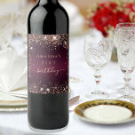 Birthday burgundy rose gold name script wine label<br><div class="desc">For an elegant 21st (or any age) birthday.  A burgundy  faux metallic looking background color. Decorated with rose gold faux glitter dust. Personalize and add a name and age. Birthday is written with a modern hand lettered style script with swashes.</div>