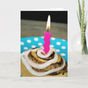 birthday candle in a cinnamon roll card