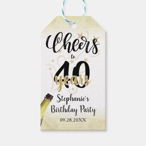 Birthday CHEERS TO # YEARS Black Gold Script Gift Tags - Celebrate any age birthday with these fun and festive editable age CHEERS TO # YEARS birthday thank you favor tags in black and gold with a celebratory drink from a wine, beer or champagne bottle, modern handwritten script typography and your custom text. The sample shows age 40 but can be changed to any age. Ideal for adult birthdays for him or her. Contact the designer via Zazzle Chat or makeitaboutyoustore@gmail.com if you'd like this design modified, on another product or would like coordinating items.