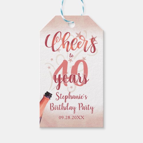 Birthday CHEERS TO # YEARS Rose Gold Script Gift Tags - Celebrate any age birthday with these chic, fun and festive editable age CHEERS TO # YEARS birthday thank you favor tags in rose gold with a celebratory drink from a wine, beer or champagne bottle, modern handwritten script typography and your custom text. The sample shows age 40 but can be changed to any age. Ideal for adult birthdays for her. Contact the designer via Zazzle Chat or makeitaboutyoustore@gmail.com if you'd like this design modified, on another product or would like coordinating items.