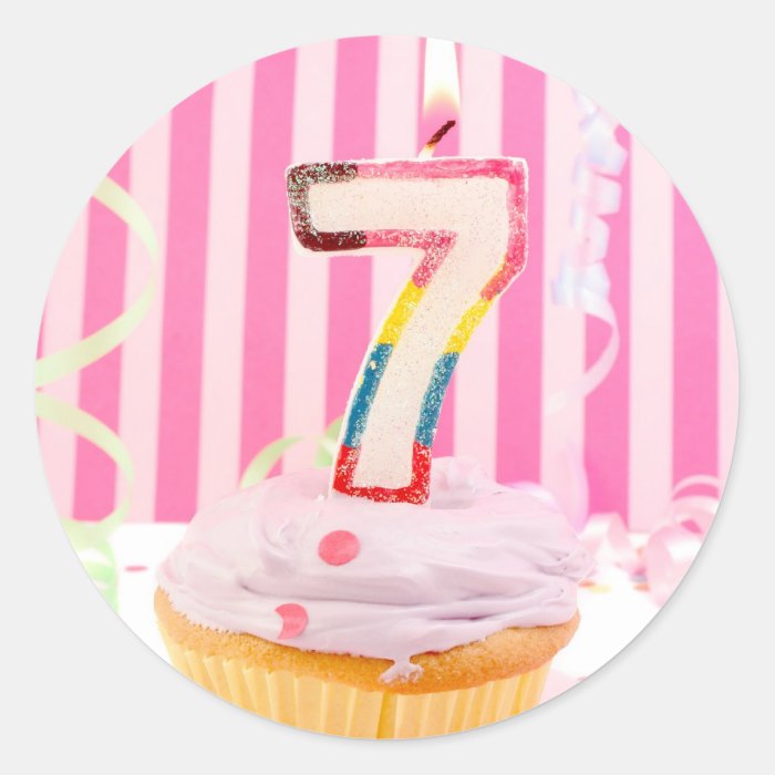 Birthday cupcake with the number 7 candle lit stickers
