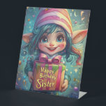 Birthday Gnome – Happy Birthday Sister Pedestal Sign<br><div class="desc">Celebrate your sister’s special day with this enchanting and whimsical birthday gnome illustration! Featuring a cheerful, wide-eyed gnome with vibrant blue hair, a pink-striped hat, and a beautifully wrapped gift that reads "Happy Birthday Sister". he background sparkles with floating confetti, ribbons, and a dreamy fantasy atmosphere, making it an ideal...</div>