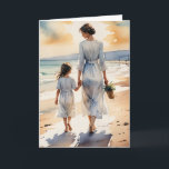Birthday Mother and Daughter Walking the Beach Card<br><div class="desc">A woman and child in flowing dresses walk hand in hand along a tranquil beach,  with the setting sun casting a warm glow over the scene.
Text can be changed.</div>