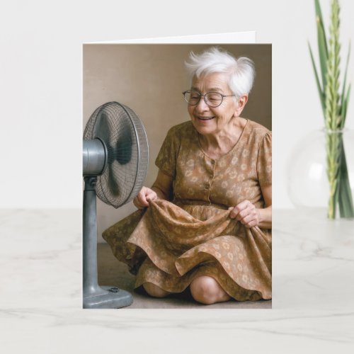 Birthday Old Lady Cooling Off By a Fan