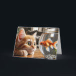 Birthday Orange Tabby Staring At a Goldfish Card<br><div class="desc">A curious kitten with orange and white fur attentively observes a goldfish swimming in a fishbowl on a wooden table for birthday.
All text can be changed.</div>