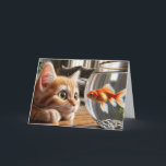 Birthday Orange Tabby Staring At a Goldfish Card<br><div class="desc">A curious kitten with orange and white fur attentively observes a goldfish swimming in a fishbowl on a wooden table for birthday.
All text can be changed.</div>