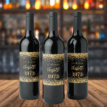 Birthday party black gold year born wine label<br><div class="desc">A black background decorated with golden confetti. The text: The name is written in dark rose gold with a large modern hand lettered style script. Personalize and add a date,  name and year of birth.</div>