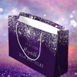 Birthday purple silver glitter dust monogram large gift bag<br><div class="desc">A gift bag for a girly and glamorous 21st (or any age) birthday. A deep purple background decorated with faux silver glitter dust. The purple color is uneven. Personalize and add a date, name and age 21. The text: The name is written in white with a modern hand lettered style...</div>