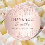 Birthday rose gold pink glitter name Thank You Classic Round Sticker<br><div class="desc">A sticker for a girly and glamorous 50th (or any age) birthday party.  A rose gold gradient background with faux glitter drips,  paint dripping look. The text: Thank You. Personalize and add name and age 50. The name is written with a modern hand lettered style script.</div>