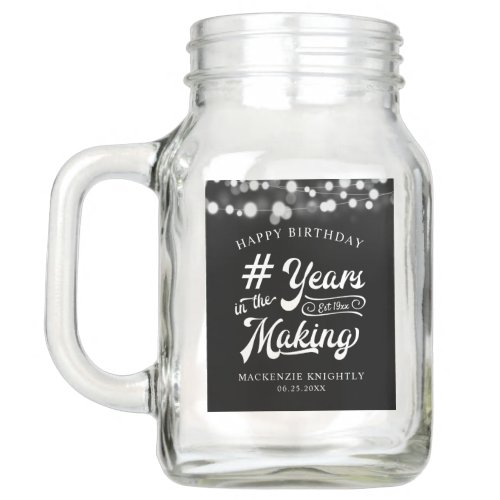 Birthday String Light YEARS IN THE MAKING Mason Jar - Celebrate any age birthday for him or her with these personalized black and white mason jar featuring a calligraphy script typography title design # YEARS IN THE MAKING that incorporates their age and birth year within the design, the editable title HAPPY BIRTHDAY and name and date or other custom text with a border of string lights. Contact the designer via Zazzle Chat or makeitaboutyoustore@gmail.com if you'd like this design modified, in another color, on another product or would like coordinating items.