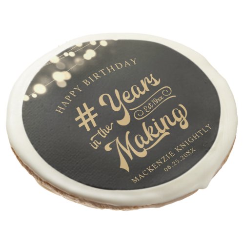 Birthday String Light YEARS IN THE MAKING Sugar Cookie - Celebrate any age birthday for him or her with these personalized black and gold sugar cookie featuring a retro calligraphy script typography title design # YEARS IN THE MAKING that incorporates their age and birth year within the design, the editable title HAPPY BIRTHDAY and name and date or other custom text with a border of string lights. Serve at a party, utilize as a commemorative party favor or surprise someone with an edible gift across the miles. Contact the designer via Zazzle Chat or makeitaboutyoustore@gmail.com if you'd like this design modified, in another color, on another product or would like coordinating items.