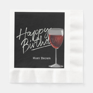 Birthday wine on black paper napkins