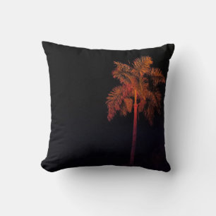 black accent pillow with palm tree