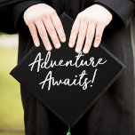 Black | Adventure Awaits Graduation Cap Topper<br><div class="desc">Chic stylish graduation cap topper featuring "Adventure Awaits" in a trendy script font against a black background. Make it your own by adding text or changing the background color with the customize tool.</div>