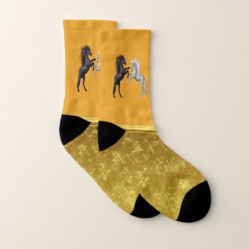 Black and a white Horse that are fighting Socks