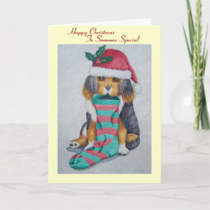 black and brown puppy with stocking for christmas holiday card