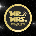 Black and Brushed Gold Mr. and Mrs. Wedding Classic Round Sticker<br><div class="desc">Introducing our exclusive Black and Brushed Gold Mr. and Mrs. Wedding Classic Round Sticker, designed with a captivating science fiction theme. Perfect for adding a touch of futuristic elegance to your wedding decor, these stickers feature a sleek black background accentuated by luxurious brushed gold accents. The bold "Mr. and Mrs."...</div>