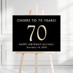 Black And Gold 70th Birthday Party Welcome Sign<br><div class="desc">Welcome guests in timeless style with this black 70th birthday party foam board sign, featuring "Cheers To 70 Years" and gold typography. Perfect for celebrating a milestone, this elegant sign sets the tone for an evening of sophistication, laughter, and memories. Personalize with your name and event date. The minimalist black...</div>
