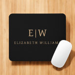 Black and Gold Minimalist Modern Monogram Mouse Pad<br><div class="desc">Elevate your desk setup with this Black and Gold Minimalist Modern Monogram Mouse Pad. Featuring a sleek black background and bold faux gold monogram, this design combines contemporary style with personalized flair. Perfect for professionals, students, or anyone who appreciates elegant desk accessories, this mouse pad adds a refined touch to...</div>