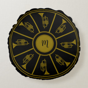 Black and gold motif with trumpets and a monogram round pillow