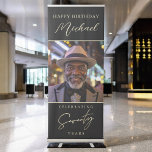 Black and Gold Script Photo 70th Birthday Retractable Banner<br><div class="desc">Make a bold statement with the Black and Gold Script Photo 70th Birthday Retractable Banner! This sleek and stylish banner features elegant black and gold script, customizable with a favorite photo and personalized text. Perfect for setting the tone at any 70th birthday celebration, it adds a touch of sophistication to...</div>