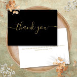 Black And Gold Simple Modern Elegant Script Thank You Card<br><div class="desc">Simple modern elegant gold script on a black background thank you card. You can personalize with your own thank you message on the reverse or if you would prefer to add your own handwritten message simply delete the text. A perfect way to say thank you! Designed by Thisisnotme©</div>