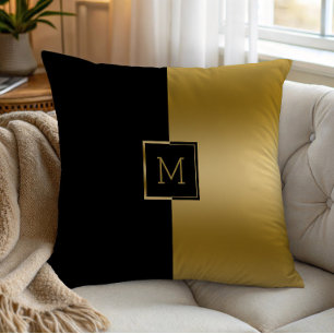 Black and gold split-screen geometric design throw pillow