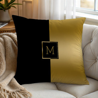 Black and gold split-screen geometric design throw pillow